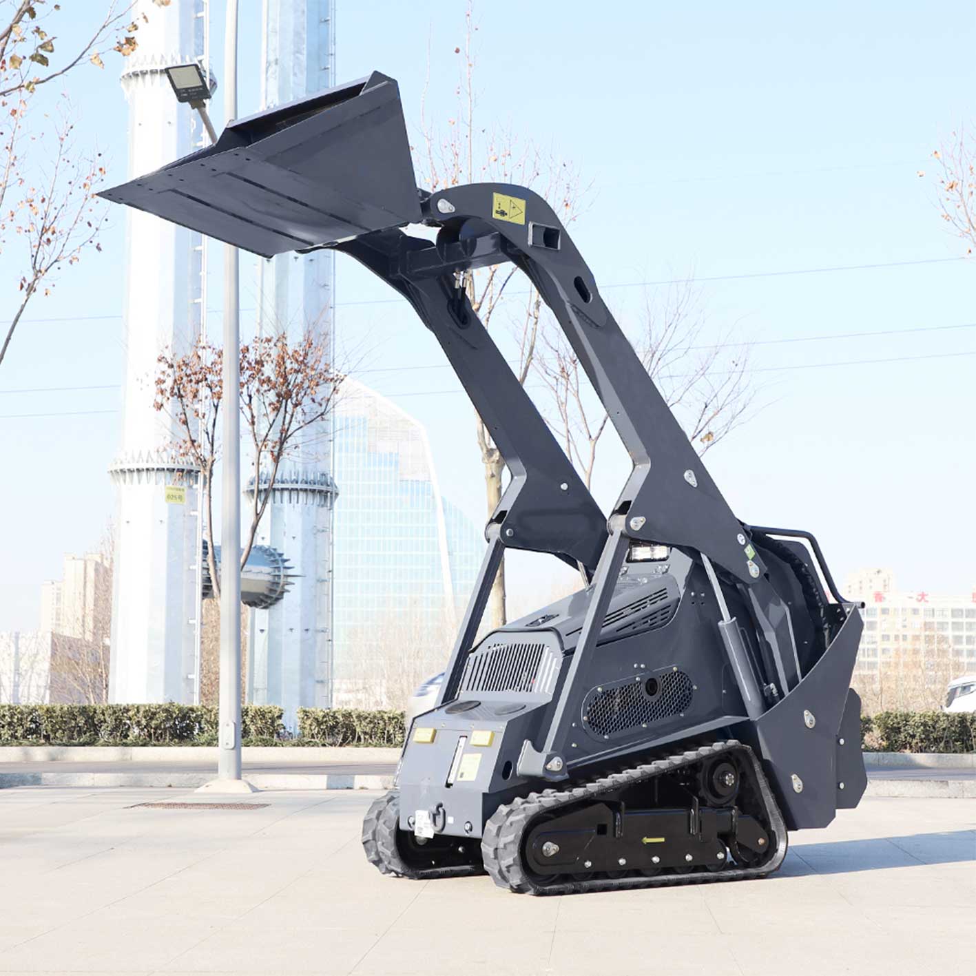 Carregadora compacta de rastos YF1000
